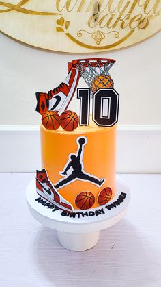 a basketball themed birthday cake with the number 10 on it