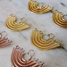 Quick reminder: Shashi is out of town for another week and shipments our of our warehouse are going to be a bit backed up through the end of the month.   Now is a great time to try some pieces from my made to order line -  @boneneArtifacts. Shown: Zenú Culture Earrings, replica of Pre-Columbian tribal earrings at the San Antonio Museum of Art. Pre Columbian Jewelry, Ornate Earrings With Intricate Design For Rituals, Traditional Bronze Filigree Earrings, Traditional Brass Chandelier Earrings With Filigree, Traditional Brass Filigree Chandelier Earrings, Byzantine Style Pierced Drop Earrings, Traditional Bronze Earrings With Ear Wire, Handmade Bronze Byzantine Jewelry, Handmade Byzantine Brass Earrings