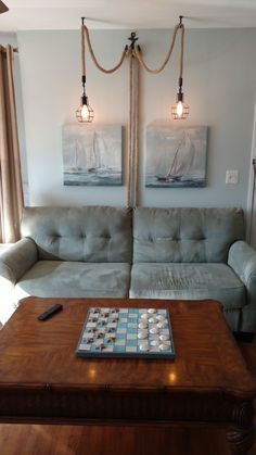 a living room with two couches and a coffee table in front of the couch