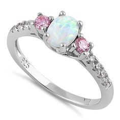 Top of Ring Height: 6.2mm

Top of Ring Width: 10.7mm

Band Width: 2mm

Shank Width: 1.9mm


Stone Material: White Opal, Pink and Clear Cubic Zirconia

Stone Shape: Oval and Round

Stone Setting: Prong


Metal: 925 Sterling Silver

Plating: Rhodium plated

Finish: High Polish Oval Cubic Zirconia Stackable Rings, Oval Three Stone Opal Promise Ring, Oval Three Stone Crystal Promise Ring, Oval Stackable Promise Rings With Accent Stones, Cubic Zirconia Opal Promise Ring, Oval Shape, Oval Crystal Promise Ring With Stone Setting, White Lab, Stone Material, Stone Setting