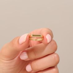 Delve into the realm of vintage glamour with our 14k Solid Gold Vintage Pinky Ring. This stunning piece is a perfect blend of timeless elegance and modern sophistication. The ring features a flat signet design, which is both classic and versatile, making it a wonderful addition to any jewelry collection. Ring Details ❥ 14k Solid Gold ( also in 10k,18k) ❥ Gold Color Options; Solid Yellow Gold, White Gold, Rose Gold ❥ Band Width: 2.16 mm ❥ Top Width: 3.48x12.12 mm ❥ Thickness: 1.55 mm ❥ Ready to S Modern 14k Stamped Jewelry For Promise, Minimalist Gold Emerald Stackable Ring, Minimalist Emerald Cut Gold Stackable Rings, Heirloom Gold Emerald Stackable Ring, Stackable Gold Emerald Cut Rings, 14k Gold Stackable Emerald Cut Rings, Modern Gold Promise Birthstone Ring, Modern Gold Birthstone Promise Ring, Minimalist Gold Emerald Cut Jewelry