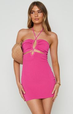 * Pink Mini Dress 
 * Live your main character moment in this stunning pink mini dress (). You'll be sure to turn heads and look like an absolute babe if you pair this with minimal heels () and gold accessories ().  
 * Cut outs at front 
 * Halter-neck with ties at neck 
 * Crossover ties at front 
 * Mini length 
 * Rounded back 
 * Unlined  
 * Thick ribbed material with stretch Blake Pink, Main Character Moment, Prom Midi Dress, 60's Dress, Summer Playsuit, Pink Mini Dress, Beginning Boutique, Strapless Tops, Long Crop Top