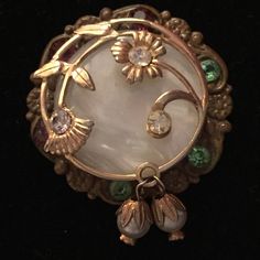 This Is A Beautiful Antique Brooch I Purchased Many Years Ago. It Was In My Collection, Never Worn. The Background Stone Is Mother Of Pearl. Tiny Crystal Stones And Small Emerald Simulated Stones. Looks Stunning On Clothes, Hat, Purse Etc. Dresses Up Any Outfit. All Stones In Tack. Animal And Smoke Free Home. Background Stone, Gemstone Brooch, Art Deco Dress, Metal Clothing, Cameo Jewelry, Vintage Cameo, Dress Clip, Antique Brooches, Antique Clothing