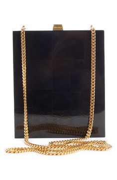 Finish off formal ensembles with this perfectly structured box bag centered by the signature YSL insignia. Push-clasp closure Crossbody chain strap Structured silhouette with flat base for stability Synthetic Made in Italy Designer Handbags Formal Bag With Chain Strap And Rectangular Case, Formal Rectangular Case Bag With Chain Strap, Modern Gold Evening Bag With Chain Strap, Modern Evening Bag With Gold-tone Logo Plaque, Modern Evening Bags With Gold-tone Logo Plaque, Modern Evening Bags With Gold-tone Logo, Luxury Formal Bags With Gold Chain, Modern Gold Evening Bag For Formal Events, Designer Rectangular Evening Bag With Chain Strap