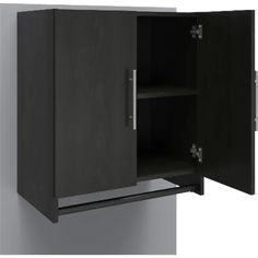 a black cabinet with its door open on the wall