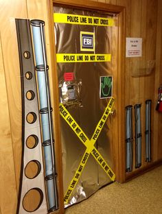 a door with caution tape taped around it