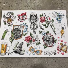 an assortment of tattoos on a piece of paper