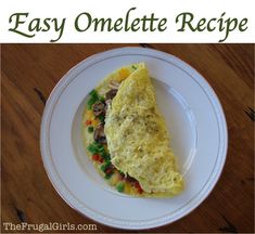 an omelette on a white plate with the words easy omelette recipe