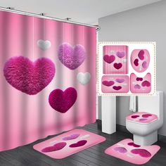 a pink bathroom with hearts on the shower curtain and rugs in front of it