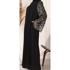 Very Elegant Black Abaya Feature: Fabric 100% Polyester Unlined Simple Sequin Crew Neck Made In Trkiye Product Measurements Bust :23" Laying Flat Length: 58" From The Shoulder. Sleeves Length: 25" I Love It, But I Need A Smaller Size, Brand New, Never Worn ,Very Soft And Very Elegant I Missed The Return Time Frame. Message Me For Any Questions. Black Abaya With Dabka For Party, Party Black Abaya With Dabka Detail, Black Dabka Abaya For Party, Black Long Sleeve Thobe For Party, Black Long Abaya With Dabka Detailing, Midi Dress Layering, Maternity Shift Dress, Black Knee Length Dress, Blue Floral Midi Dress