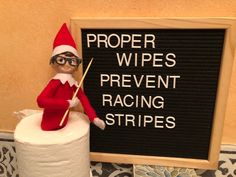 the elf is holding a stick in front of a sign that says proper wipes prevent racing stripes