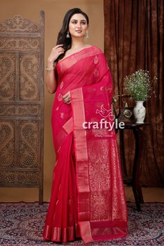 Elevate your wardrobe with our Claret Red Handloom Saree with Zari Work. This saree pays homage to the rich textile heritage of Bengal and features traditional motifs and contemporary designs. It is made from soft and breathable fabric, drapes gracefully, and offers utmost comfort. Expertly crafted and elegantly designed, this saree is perfect for any occasion and a must-have in your collection. Add it to your wardrobe and experience the beauty of traditional Indian fashion.Saree Length : 5.5 me Red Cotton Silk Blouse With Traditional Patterns, Red Cotton Silk Saree With Zari Weaving, Red Cotton Silk Saree With Traditional Patterns, Red Handloom Saree For Eid, Red Cotton Silk Saree For Eid, Red Bollywood Style Handloom Traditional Wear, Red Slub Silk Handloom Traditional Wear, Red Handloom Chanderi Traditional Wear, Red Slub Silk Traditional Wear With Patterns