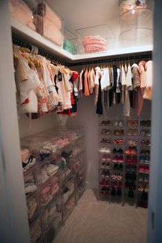 the closet is full of baby clothes and shoes