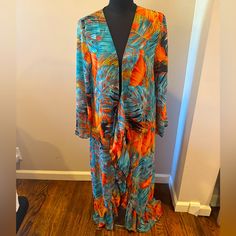 Great Condition. Never Worn. Versatile. Can Use As A Kimono Or As A Swim Cover Up. Floral Print Flowy Maxi Cover-up, Tropical Long Sleeve Cover-up For Beach Season, One Size Open Front Cover-up For Day Out, Chic Long Sleeve Beach Robe, Chic Wrap Robe For Vacation, Chic Open Front Kimono For Vacation, Beachwear Cover-up With Kimono Sleeves For Day Out, Printed Kimono Beach Cover-up For Beach Season, Multicolor Long Sleeve Cover-up For Beach Party