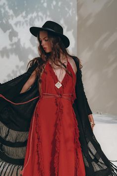 Long Bohemian Dress With Back Tassel Tie-up, Bohemian Maxi Dress With Fringe, Red Tasseled Maxi Dress For Summer, Sleeveless Red Dress With Fringe, Red Maxi Dress With Tassels For Summer, Red Fringe Dresses For Summer, Red V-neck Dress With Tassels, Red Summer Dress With Tassels, Bohemian V-neck Fringe Dress