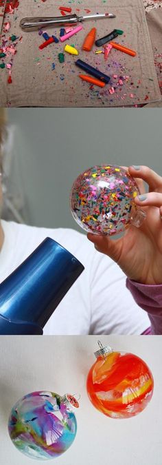 a woman holding up a glass ball with sprinkles on it