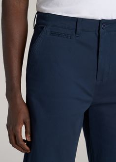 About Our Men's Long Chino Shorts Look stylish and beat the heat in these chino-style tall men's shorts. They're a shorter version of our popular chino pants that you'll want to wear all summer long. Finding clothes when you're tall is hard enough, but finding shorts is a whole other story – you need a pair that's long enough while still providing a flattering fit. That's where we come in. We crafted these shorts with your height in mind, with two different inseam options that end at the knee an Summer Tapered Leg Chino Cotton Twill Pants, Summer Tapered Leg Chinos In Chino Cotton Twill, Fitted Straight Leg Bermuda Shorts, Summer Straight Leg Chino Cotton Twill Bottoms, Summer Straight Leg Chino Bottoms, Straight Leg Pants With Built-in Shorts, Summer Casual Chino Cotton Twill Bottoms, Cotton Bermuda Bottoms With Welt Pockets, Casual Short Pants With Welt Pockets