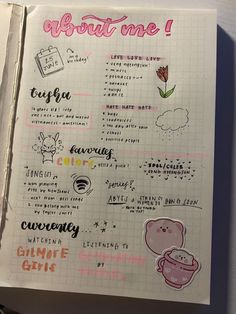 an open notebook with stickers on it and writing about what's in the book