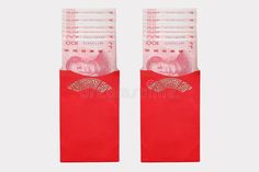 two red bags with chinese money sticking out of them royalty images and clippings