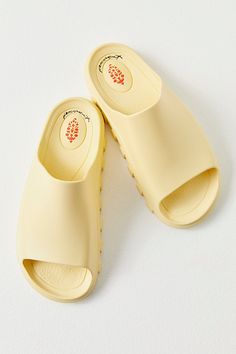 A pre- and post-workout essential, these sporty slides are featured in a smooth fabrication and slip-on style with a dreamy, cushioned insole, a single wide strap, and bold traction details perfect for taking you from the studio to the street. * Buti logo detailing * Flat-sole style * Lightweight design **Sizing:** * S: EU 35/36, US 5/6* M: EU 37/38, US 7/8* L: EU 39/40, US 9/10* XL: EU 41/42, US 11/12**Fit:** This style runs true to size; if in between sizes, we suggest sizing up.**About This I Summer Mules, Single Wide, Gentle Fawn, Shady Lady, Black Tape, Workout Essentials, Mule Sandals, Free People Movement, Sand Dollar