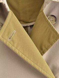 F00196827-101 Elegant Khaki Collared Outerwear, Beige Cotton Outerwear For Office, Beige Double-breasted Cotton Outerwear, Elegant Solid Color Cotton Outerwear, Double-breasted Cotton Office Outerwear, Chic Khaki Outerwear With Buttons, Spring Khaki Outerwear With Hidden Button Closure, Khaki Spring Outerwear With Hidden Button Closure, Khaki Outerwear With Hidden Button Closure For Spring