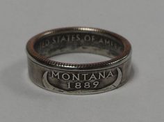 MONTANA    us quarter  coin ring size  or by COINRINGSandTHINGS Adjustable Commemorative Jewelry, Vintage Stamped Coin Jewelry, Montana Silversmith Jewelry Rings, Montana Silversmith Jewelry Necklaces, Nickel-free Sterling Silver Coin Necklace As Gift, Antique Coin-shaped 925 Stamped Jewelry, Coin Art, Woven Wrap, Skin Discoloration