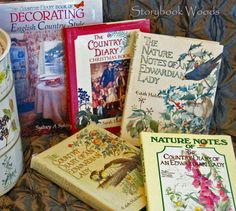 there are many books on the bed next to each other and a coffee cup in front of them