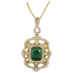 Fresh and lively best describes this 18k yellow gold pendant from Le Vian Couture centered with a 2-carat cushion cut Tsavorite nestled within a halo of Vanilla Diamonds in an elaborate scallop edged setting accented with Vanilla Diamonds, 1/2 ct t.w. Vanilla Diamonds. A coordinating ring is also available. Please feel free to reach out with any questions! Item comes with a Le Vian® jewelry box as well as a Le Vian® suede pouch! Le Vian Jewelry, Gold Couture, Rose Gold Diamond Necklace, Levian Jewelry, Diamond Drop Necklace, Le Vian, Gold Diamond Necklace, Modern Necklaces, Brown Diamond