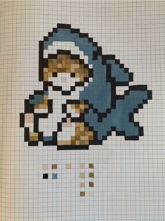 an image of a woman with a hat and scarf on her head, in cross stitch