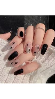 Embrace cosmic elegance with these celestial-inspired black nail designs! 🌠🖤 #CosmicElegance #CelestialNails #NailArt Black Moon Nails Acrylic, Black Star And Moon Nails, Black And White Simple Nail Designs, Black Moon Nail Designs, Simple Celestial Nails, Black Nails Inspiration Nailart, Short Witchy Nails Simple, Black Nails With Silver Stars, Celestial Nails Short