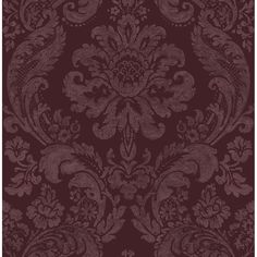 an ornate wallpaper pattern in dark red