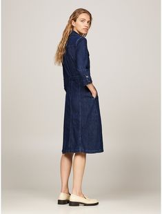 Tommy Hilfiger women's dress. Create casual style effortlessly with this midi-length denim dress, designed with a matching belt to cinch the waist.  Material: 86% Better Cotton Initiative, 14% Recycled Cotton. Casual Fitted Belted Dress For Spring, Belted Denim Dress For Summer Workwear, Chic Belted Knee-length Denim Dress, Chic Belted Denim Dress For Work, Chic Knee-length Belted Denim Dress, Denim Knee-length Shirt Dress For Work, Belted Knee-length Denim Dress, Casual Fitted Midi Belted Dress, Knee-length Belted Denim Dress For Work