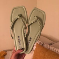 Light Sage Green Shein Flip Flop Sandals With A Woven Strap. Sooo Comfortable And Soft! The Strap Is The Same Plushy/ Soft Material As The Rest Of The Shoe So It Doesn’t Rub And Isn’t Uncomfortable. Only Selling Because I Didn’t Realize I Ordered A 5.5 Not A 5 And They Run True To Size. Last Photo Is A Different Pair Of Shein Shoes That Shoe The True Color. Green Toe Post Flip Flops For Summer, Green Single Toe Strap Flip Flops For Beach, Trendy Green Flat Flip Flops, Green Summer Flip Flops, Shoes Sage Green, Shein Sandals, Brown Thigh High Boots, Black Cowgirl Boots, Shein Shoes