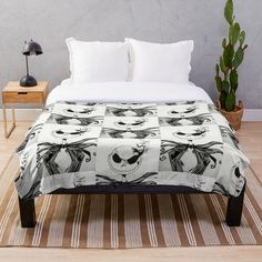 a black and white pattern with skulls on it