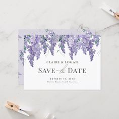 save the date card with purple flowers on it