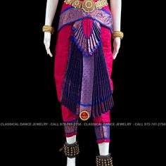 Design by Classical Dance Jewelry® ❥ Traditional Bharatanatyam costume wore during regular dance programs or arrangetram performance. ❥ Material : Art Silk ❥ Type : Traditional pant costume ❥ Easy to wear ❥ layer front fan ❥❥❥❥ 32 inch PANT LENGTH Dress Measurements ( all the measurements approximately 1 -2 margin buffer) Age: 9 - 12 yrs ❥ PANT MEASUREMENTS: ☛ Pant Length: 31-32 inch ☛ Pant Waist: 29-30 inch ☛ Pant Hip: 30-31 ❥ BLOUSE MEASUREMENTS: ☛ Blouse length: 11-12 inch ☛ Blouse Shoulder : Traditional Dance Sets With Zari Work, Traditional Saree For Dance And Festivals, Fitted Traditional Wear For Dance, Traditional Drape Saree For Dance, Traditional Festive Wear For Dance, Traditional Wear With Patterns For Diwali Dance, Traditional Wear With Drape For Dance And Festivals, Ceremonial Churidar With Traditional Drape For Festivals, Traditional Wear For Dance Festivals