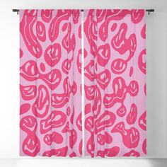 a pink curtain with hearts drawn on it