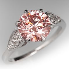 This fabulous vintage French solitaire ring is crafted of 18k white gold and now holds a 2.28ct lab grown diamond that is IGI certified and grades fancy vivid pink in color and VS2 in clarity. The ring is currently a size 6.25. EraGem lab diamond rings will arrive with an in-store certification as well as the IGI report and a lovely EraGem logo presentation box. Formal Pink Diamond Ring In Platinum, Classic Pink Gia Certified Diamond Ring, Gia Certified Pink Diamond Ring, Pink Gia Certified Diamond Ring For Formal Occasions, Gia Certified Pink Platinum Rings, Formal Pink Gia Certified Diamond Ring, Elegant Pink Diamond Ring In Platinum, Pink Diamond Cut Diamond Ring, Classic Pink Platinum Jewelry