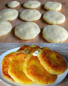 some food is sitting on a white plate next to other foods that have been cooked