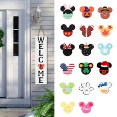 mickey mouse door hangers are on the front and side of a house, next to a welcome sign