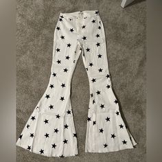 Never Worn, White With Black Stars Flare Jeans. Perfect For Boots, Very Stretchy And Super Comfy! High Rise, Fits About 25-26 Waist Buckle Jeans, Black Stars, Clothes Sewing, Clothes Sewing Patterns, Flared Jeans, Black Star, Jeans Brands, Colored Jeans, Art Works