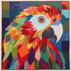 a colorful parrot is depicted in this quilt