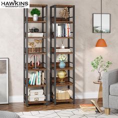 a living room with a gray couch and bookcase in the corner next to a chair