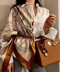 42 Hermes Scarf Outfits: What To Wear With a Hermes Scarf? Scarves Aesthetic, Hermes Scarf Outfit, Hermes Clothing, Silk Scarf Outfit, Scarf Outfits, Scarf Styling, Silk Scarf Style, Ways To Wear A Scarf, Wear A Scarf