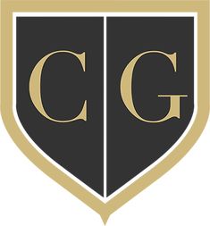 the letter c on a black and gold shield