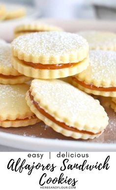 some cookies are on a white plate with the words easy delicious alparress sandwich cookies