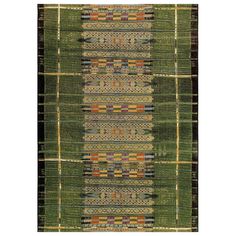 an area rug with many different colors and patterns