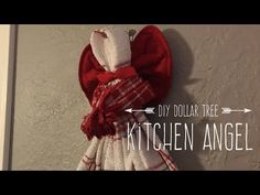 a kitchen angel hanging on the wall with text overlay that reads diy dollar tree kitchen angel