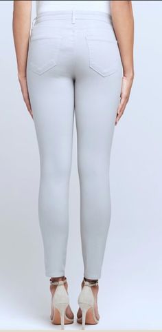 The Margot high-rise skinny jean in a coated premium stretch denim features a subtle, luxurious sheen and cool light gray hue. Contoured waistband and tapered leg hug from waist to ankle, defining and slimming the silhouette. Includes 5-pocket construction and a front zip fly closure. 86% Cotton 11% Elastane 3% Spandex Rise: 9.5" Inseam: 26" Leg Opening: 9.5" Favorite Boots, Mens Fall, Pant Shirt, Denim Jean, Swimwear Tops, Sweater Skirt, Short Pants, Jean Coat, Kid Shoes