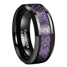 purple and black ceramic ring with an intricate design inlayed to the inside of it